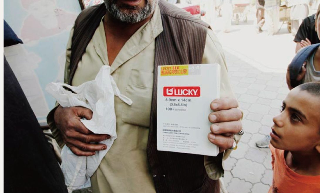 Rohullah, Kabul, 2011 — down to his last packs of photographic paper.